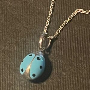 Sterling silver and blue enamel ladybug necklace
